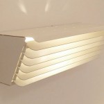 White lacquered wall light with shutters by Jacques Biny