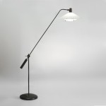 Counterweight floor lamp with ball joint in the base by Robert Mathieu