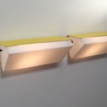 Pair of yellow wall lights by Jacques Biny