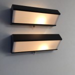 Pair of black wall lights model 239 by Jacques Biny