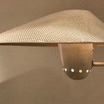 Rare wall light with perforated lampshade by Jean Boris Lacroix