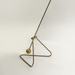 Pendulum floor light in brass by Robert Mathieu